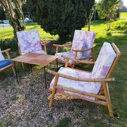 4 bamboo armchairs and a vintage coffee table