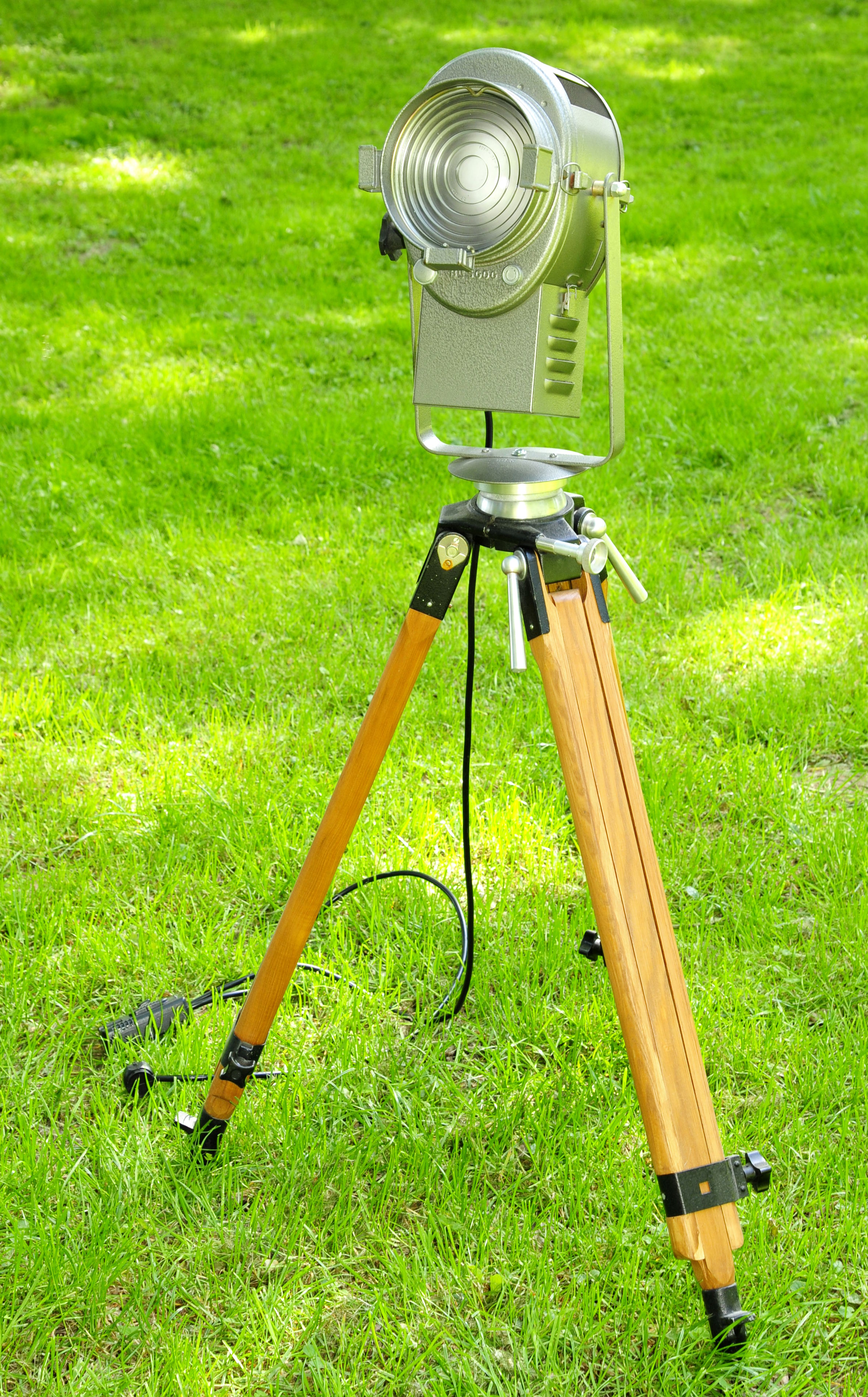 Cremer cinema projector on wooden tripod