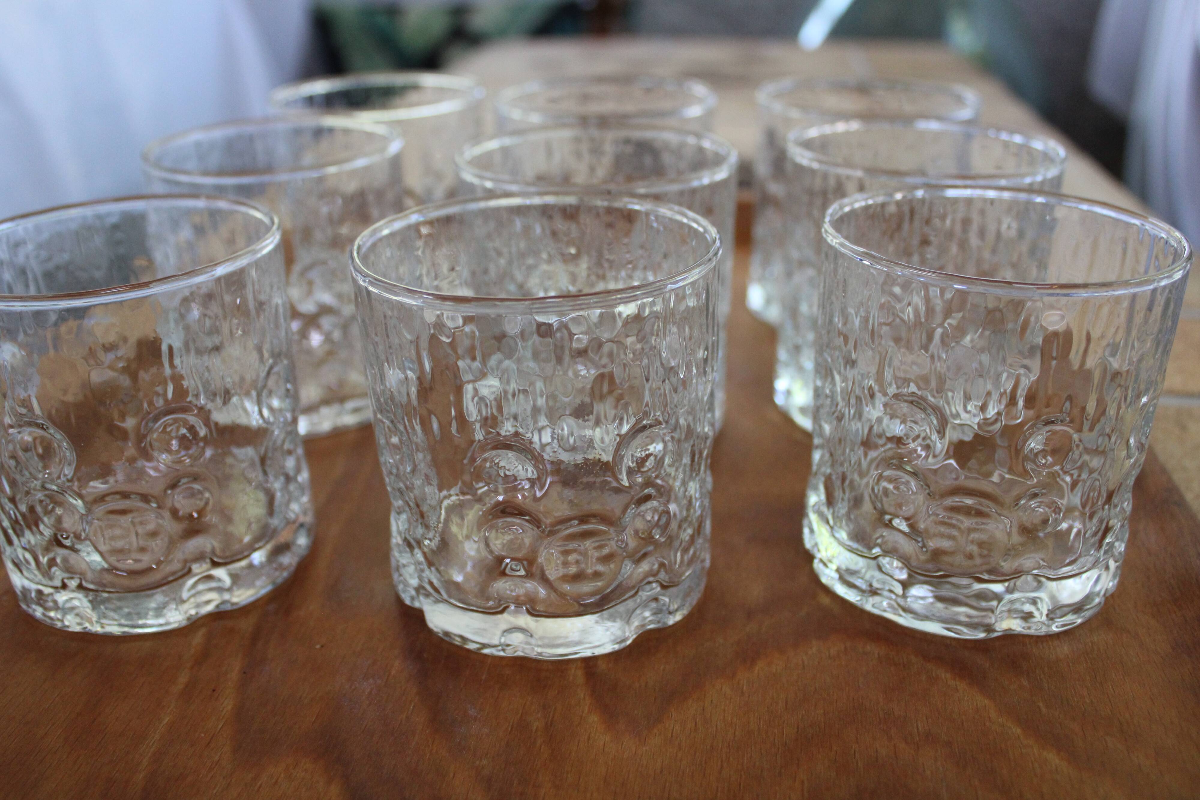 Set of 11 advertising glasses BP 70's