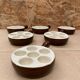 Set of 6 émile henry snail dishes in beige brown ceramic pan