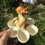 Egg cup with central chick decoration