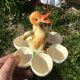 Egg cup with central chick decoration