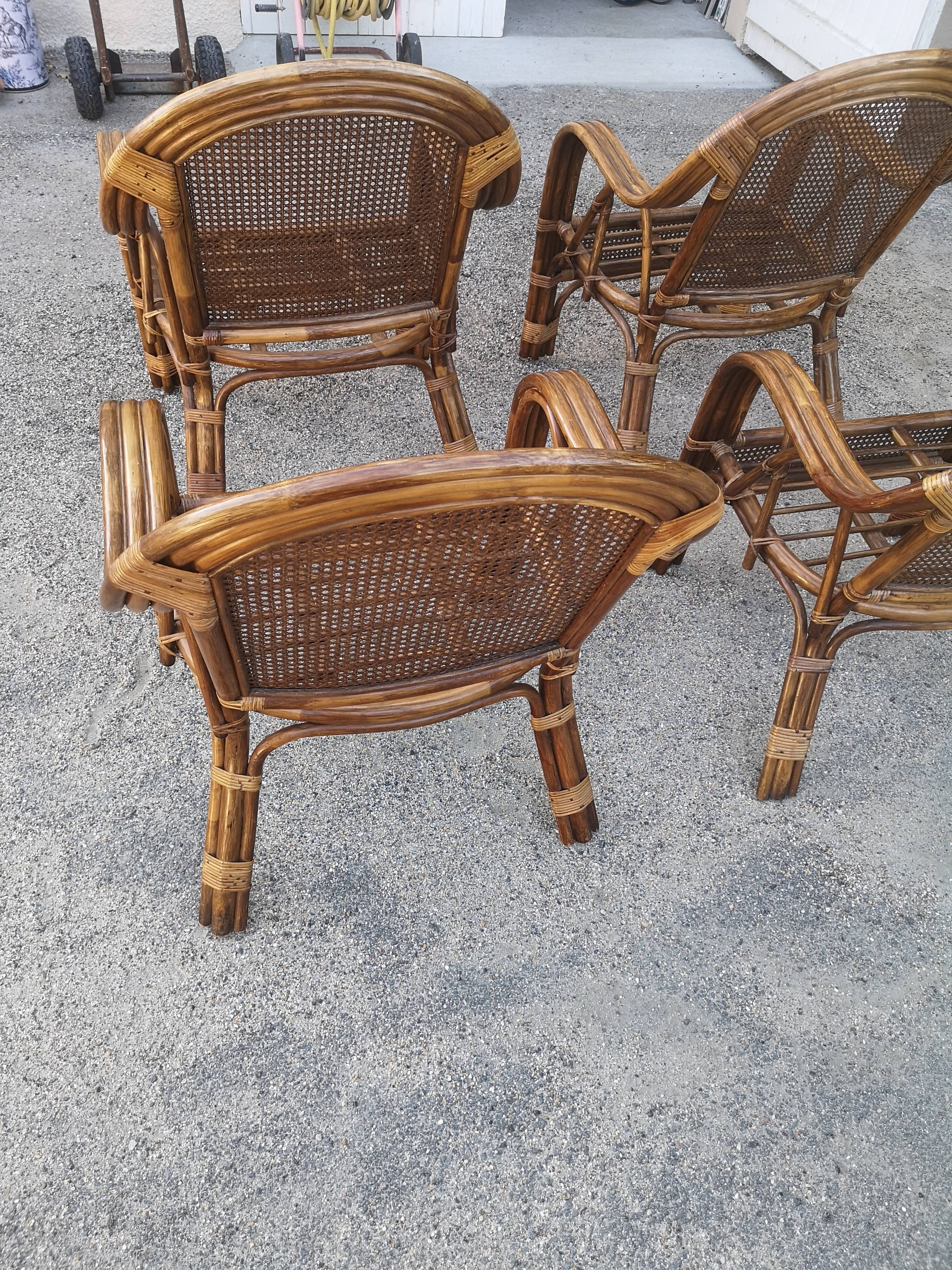 4 vintage rattan armchairs