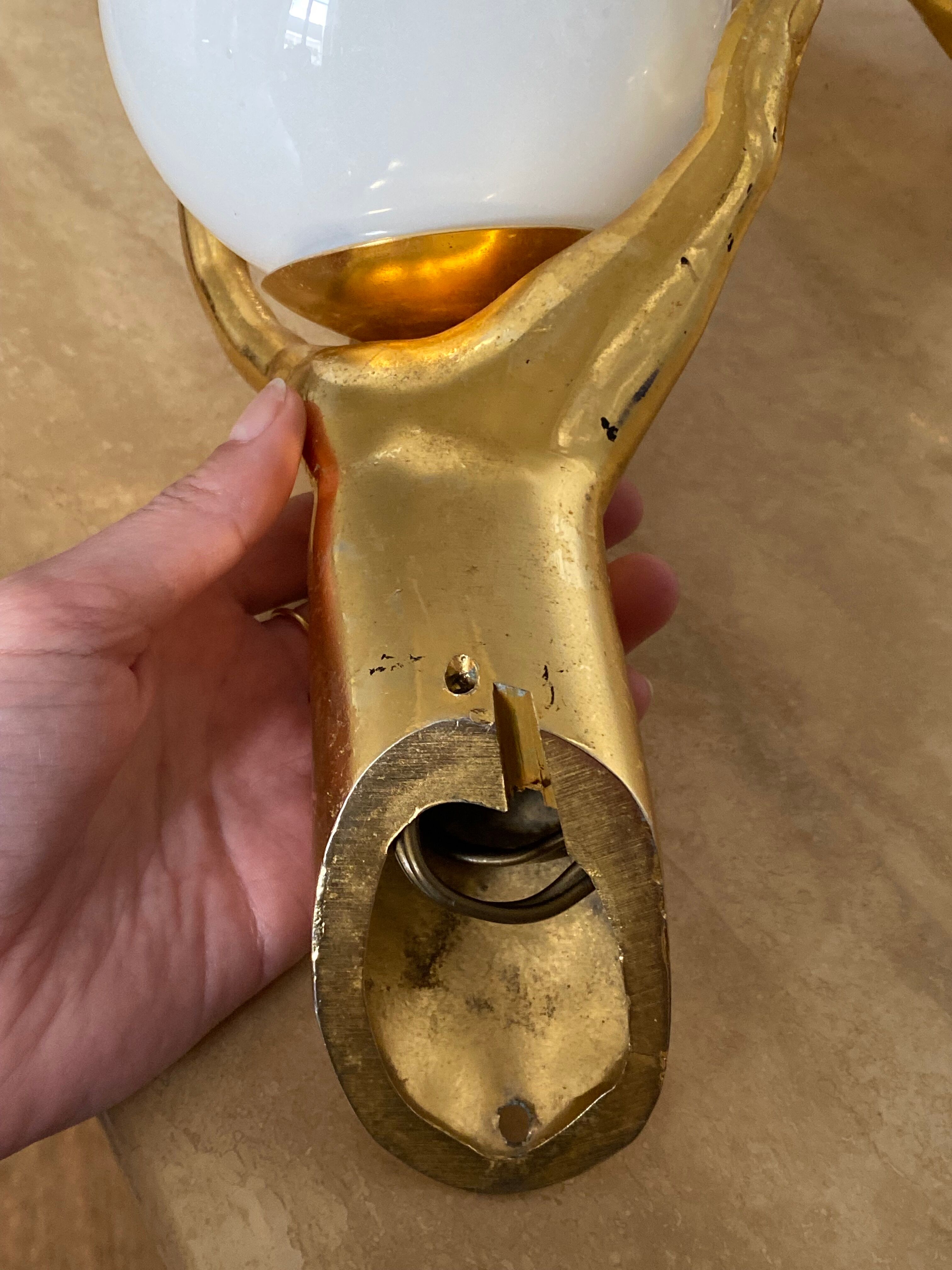 Pair of Arlus hand sconces