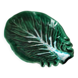 Vintage green slipware bowl in the shape of a cabbage leaf.