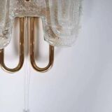 Space Age wall light in glass by Hillebrand, brass and glass.