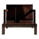 Small low armchair in varnished brown wood