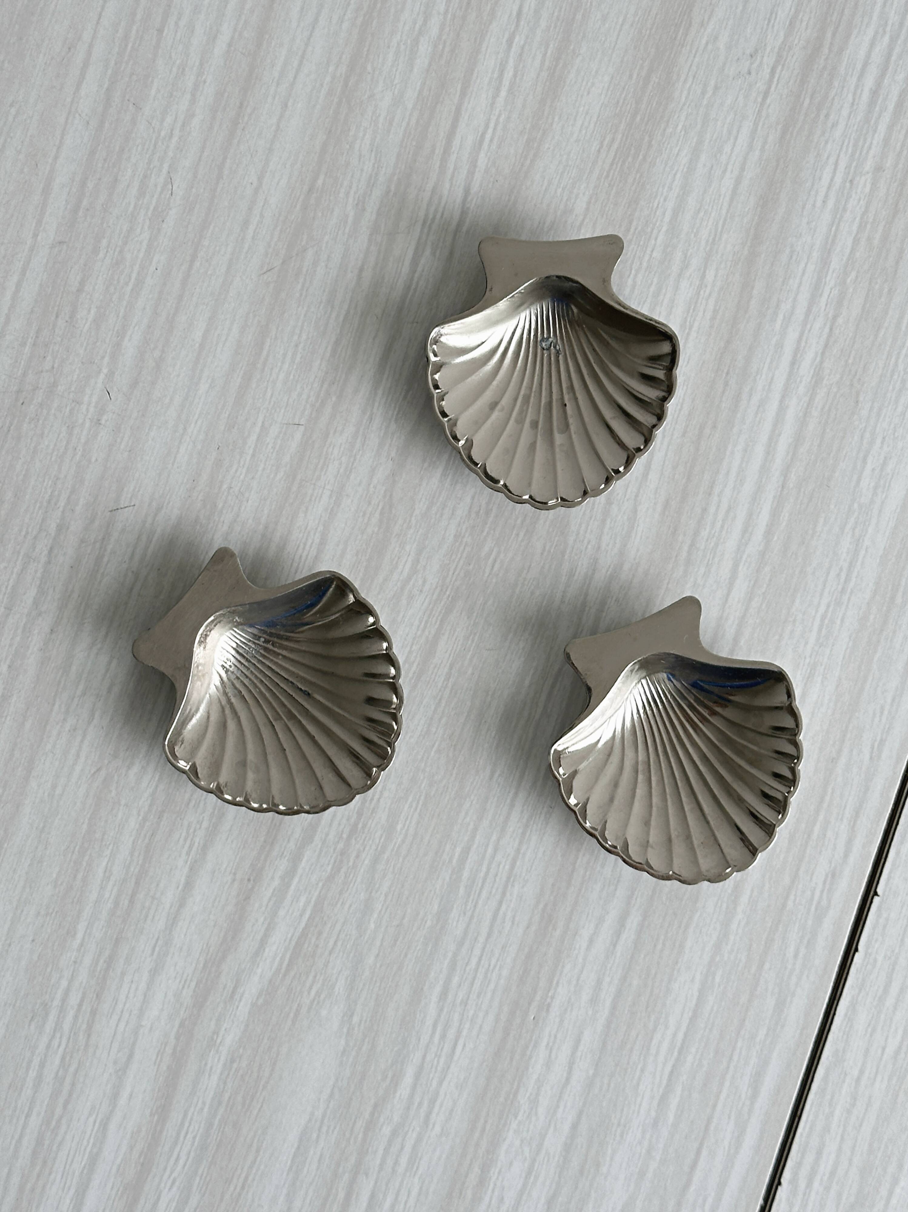 set of 3 metal shell bowls