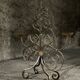 Pair of French wrought iron candelabra from the 19th century.