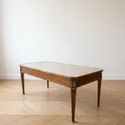 Louis XVI style coffee table in wood and marble with bronze ornaments.