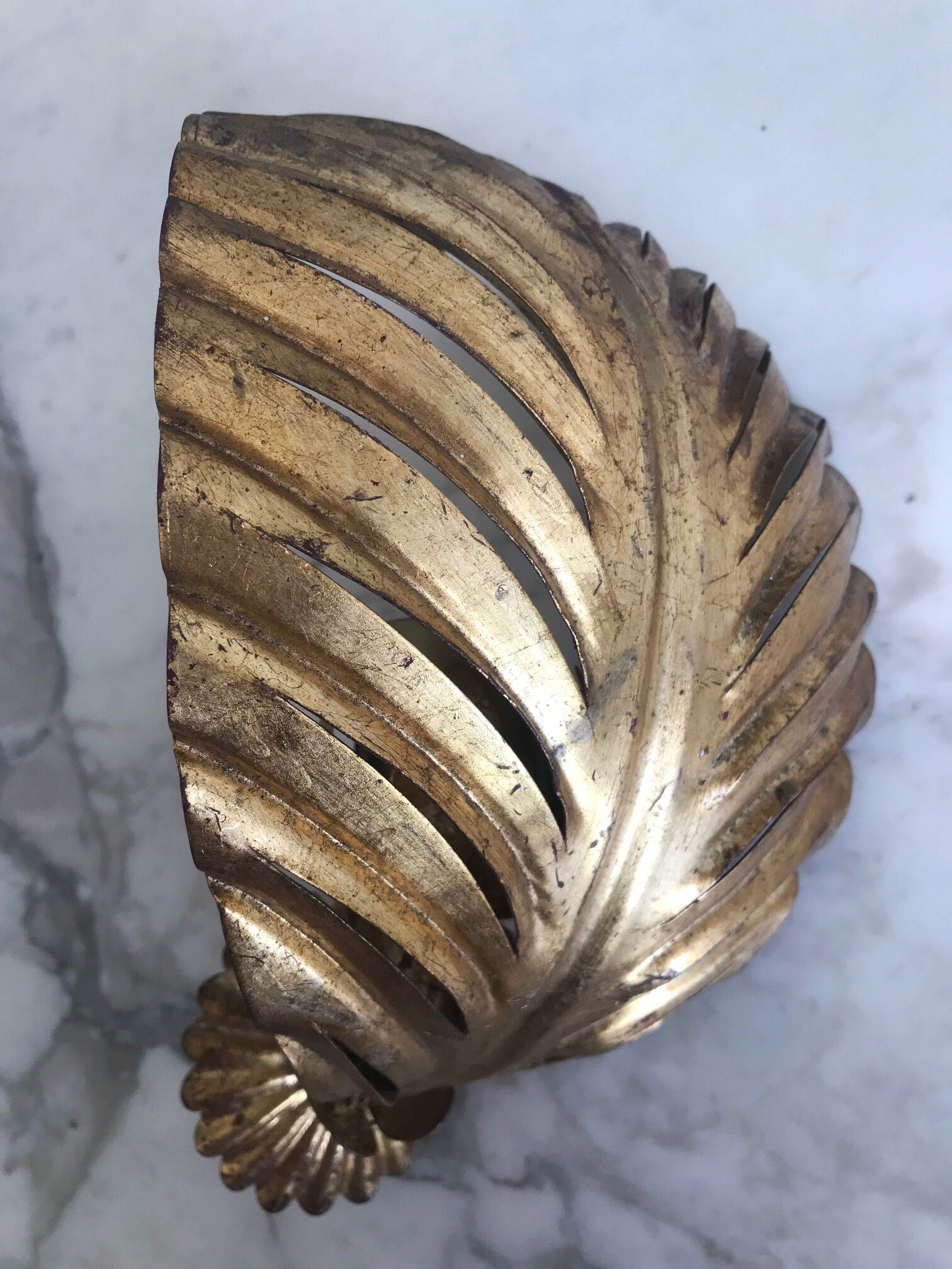 Gold metal leaf wall light