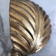Gold metal leaf wall light