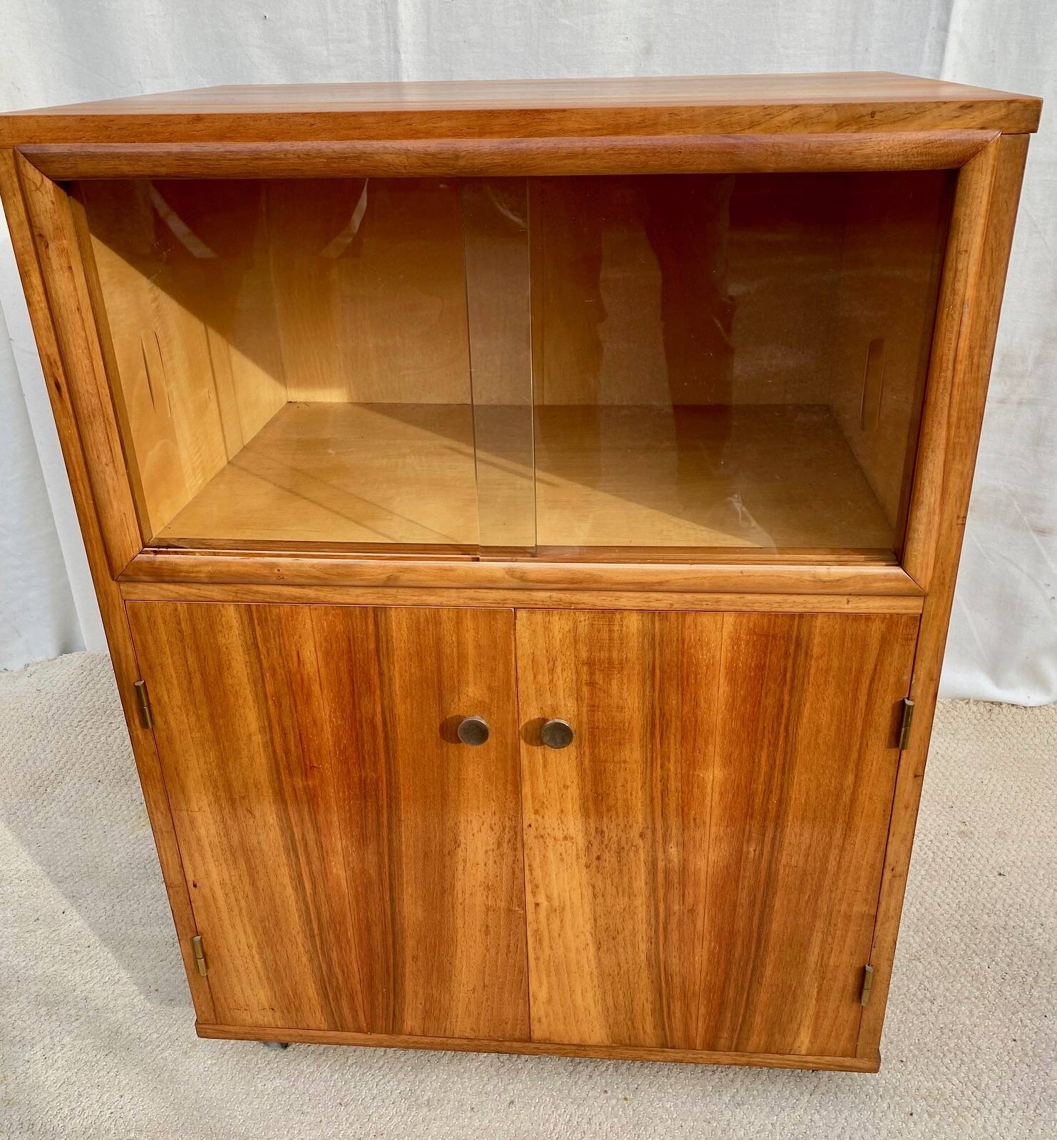 Scandinavian bar cabinet on casters