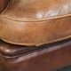 Fauteuil club en cuir de mouton vintage