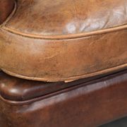 Fauteuil club en cuir de mouton vintage
