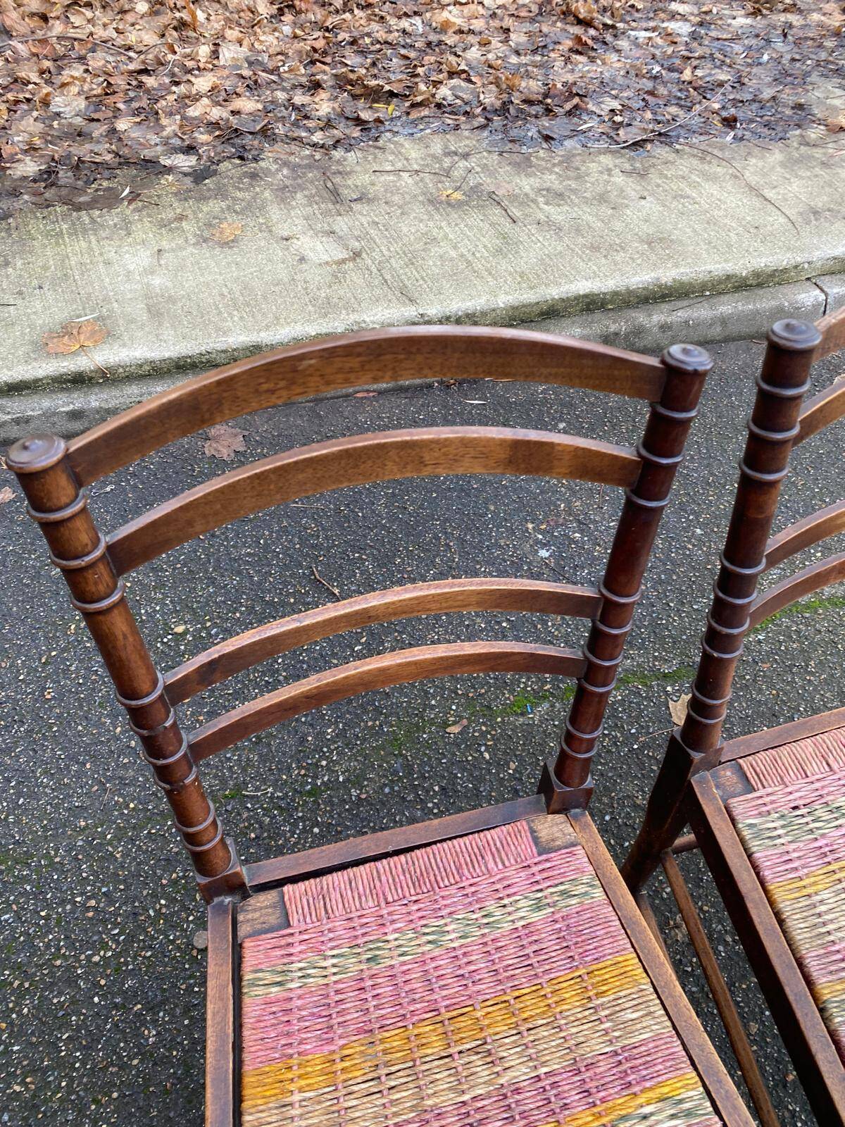 Two 19th-century carved chairs in solid wood and woven rope