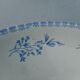 White earthenware salad with blue décor