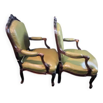 Pair of large 19th-century green leather armchairs in Louis XV style.
