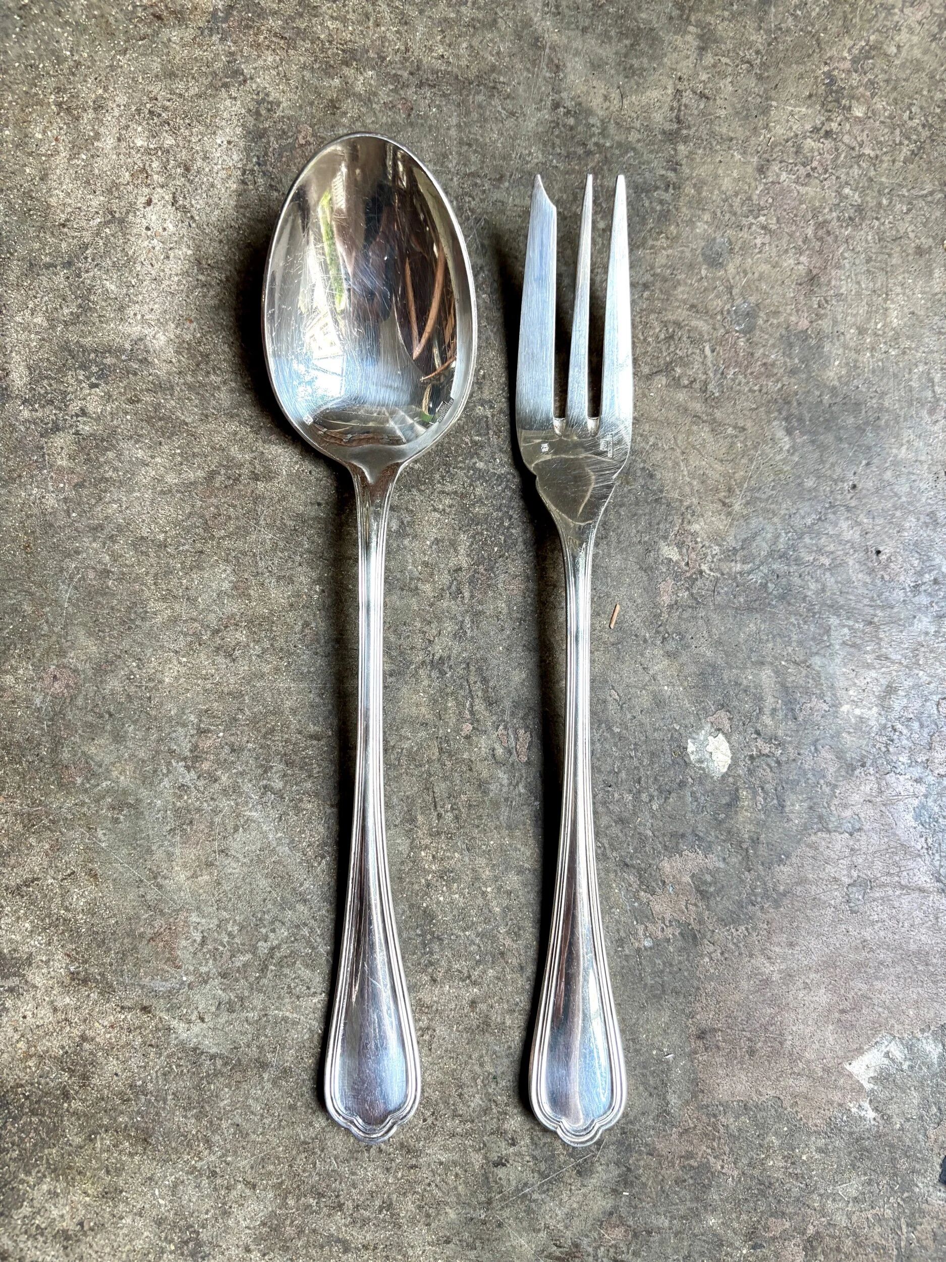 2 Christofle silver-plated serving cutlery, "Spatours" pattern.