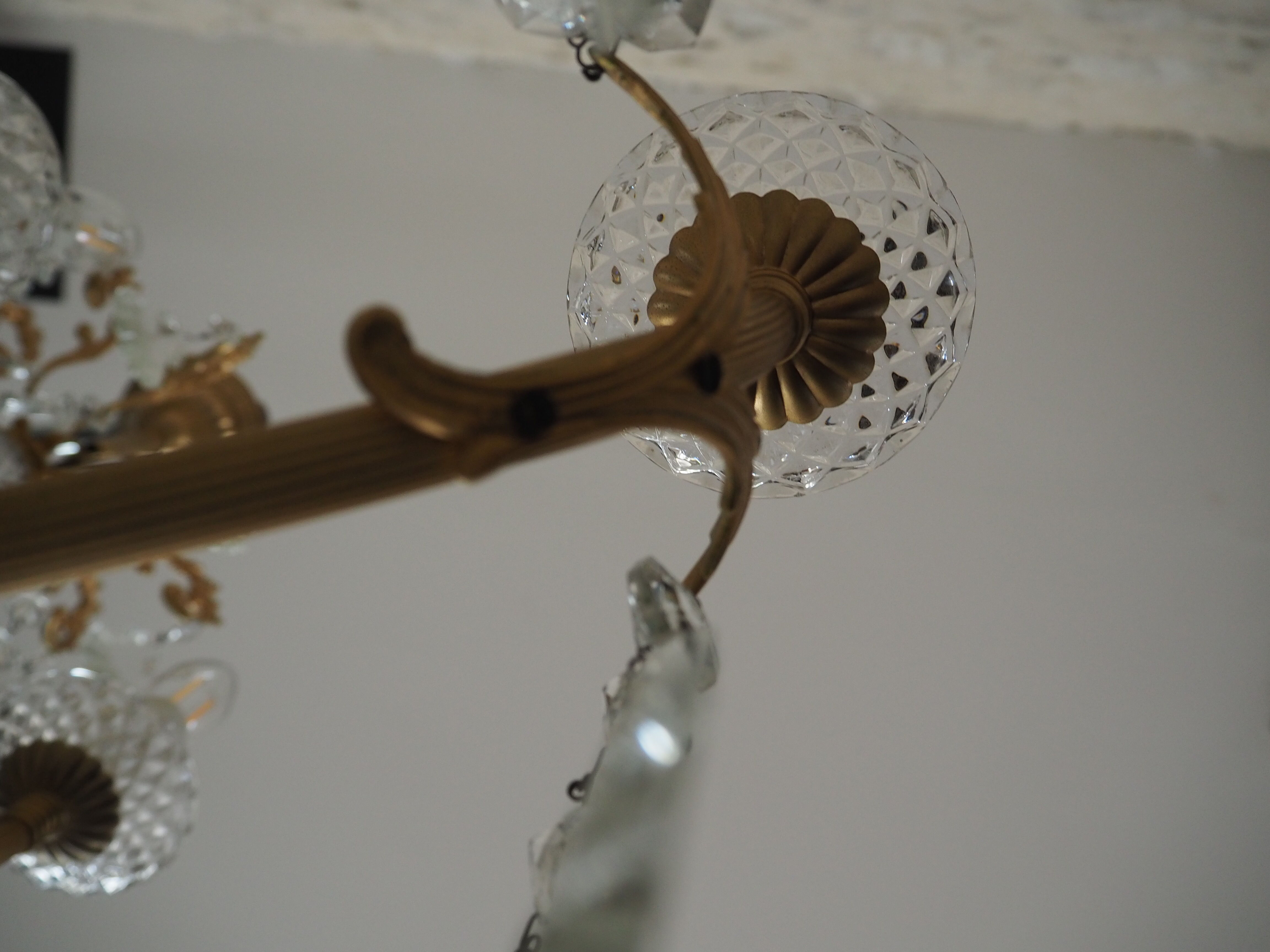 Chandelier 12 lamps with grapevines in crystal, bronze and regulated