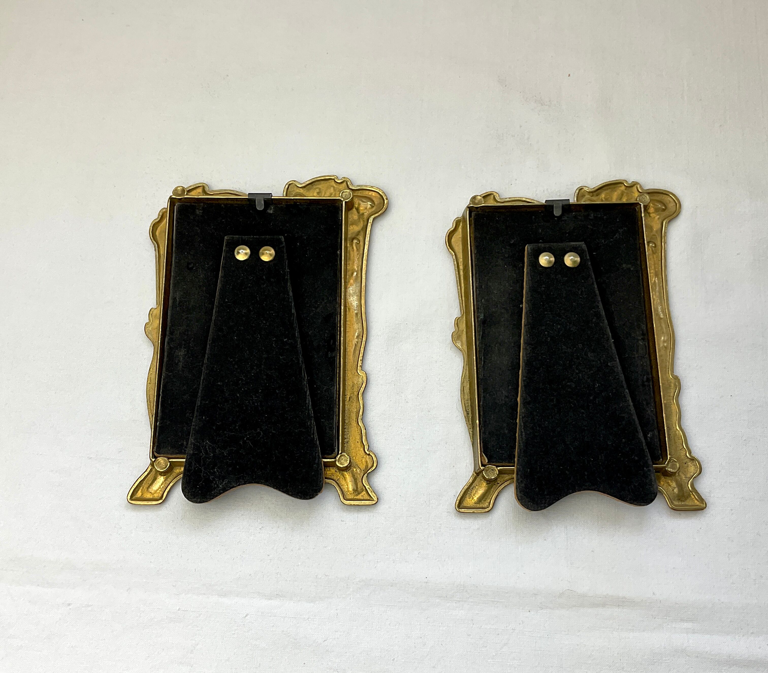 Pair of brass frames with Art Nouveau style woman