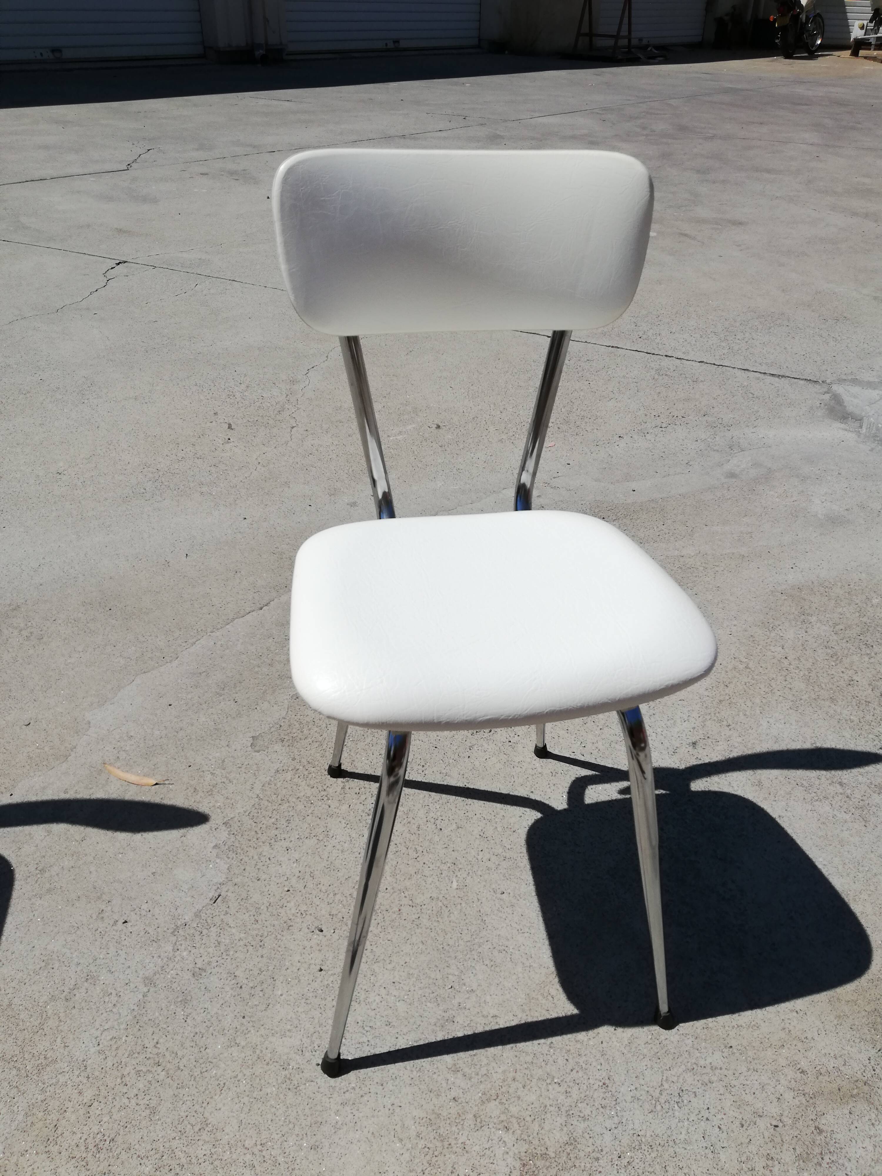 Set table and kitchen chairs in formica and skai