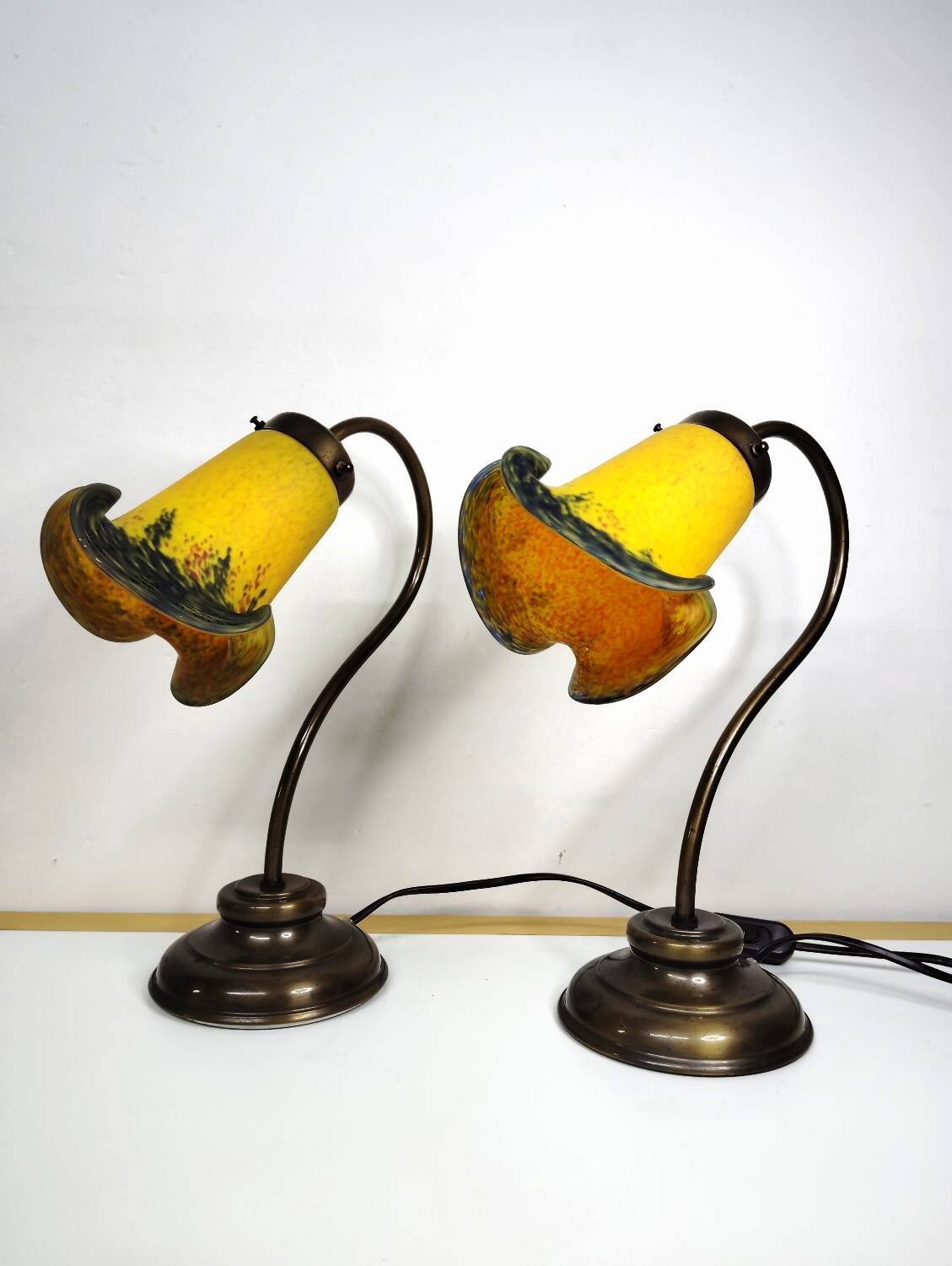 Pair of tulip swan neck bedside lamps in glass paste