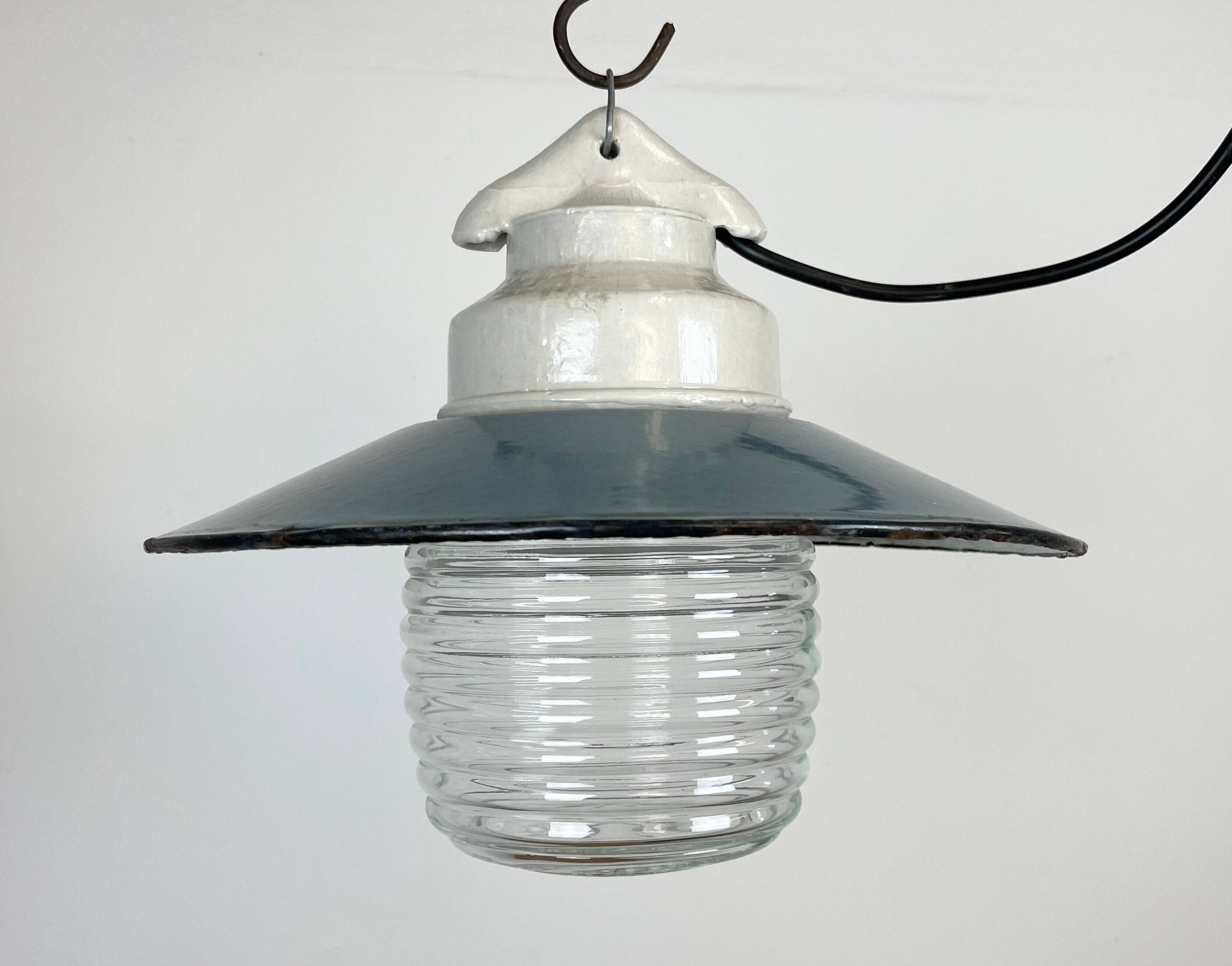 Industrial porcelain blue enamel pendant light with ribbed clear glass, 1970s