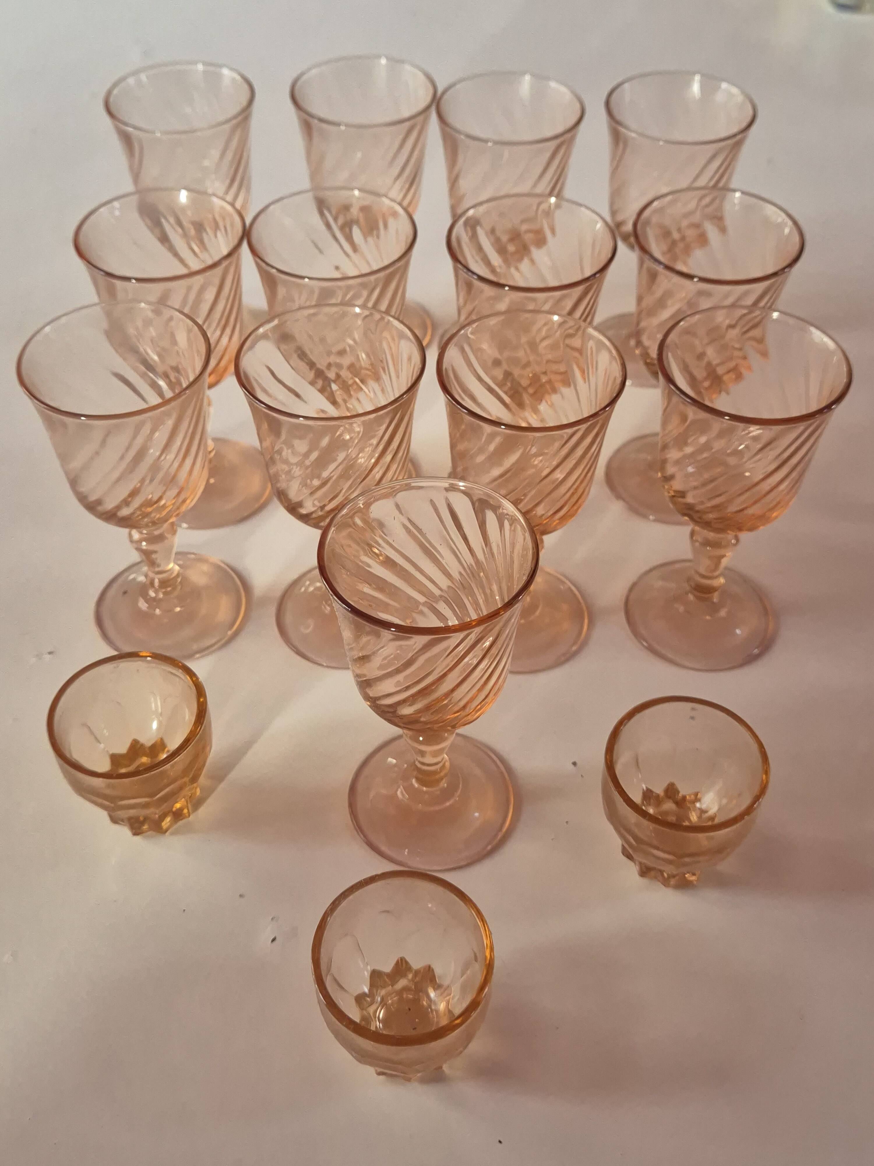 set of 12 stemmed glasses and 3 small vintage pink liqueur glasses in rosaline
