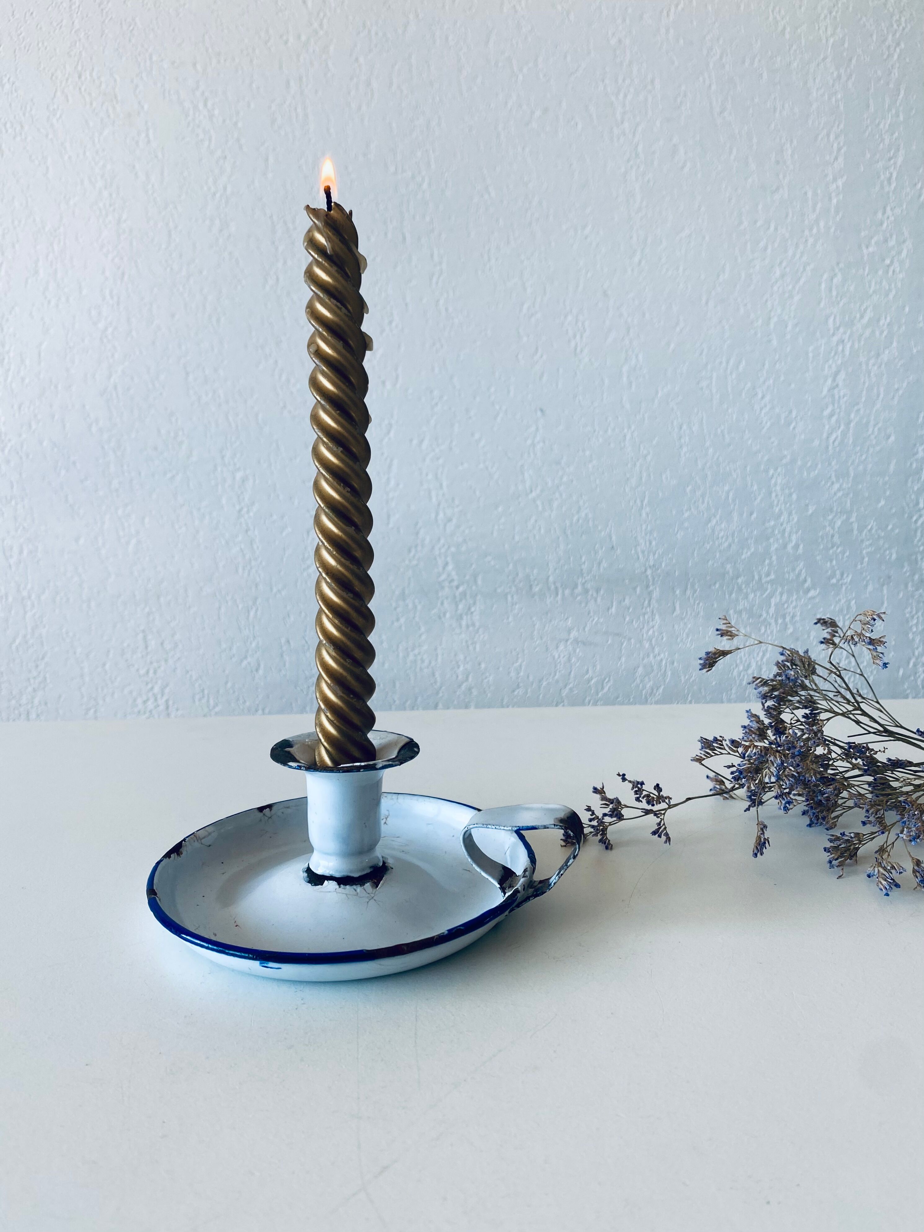 Antique candle holder in white and blue enamelled metal