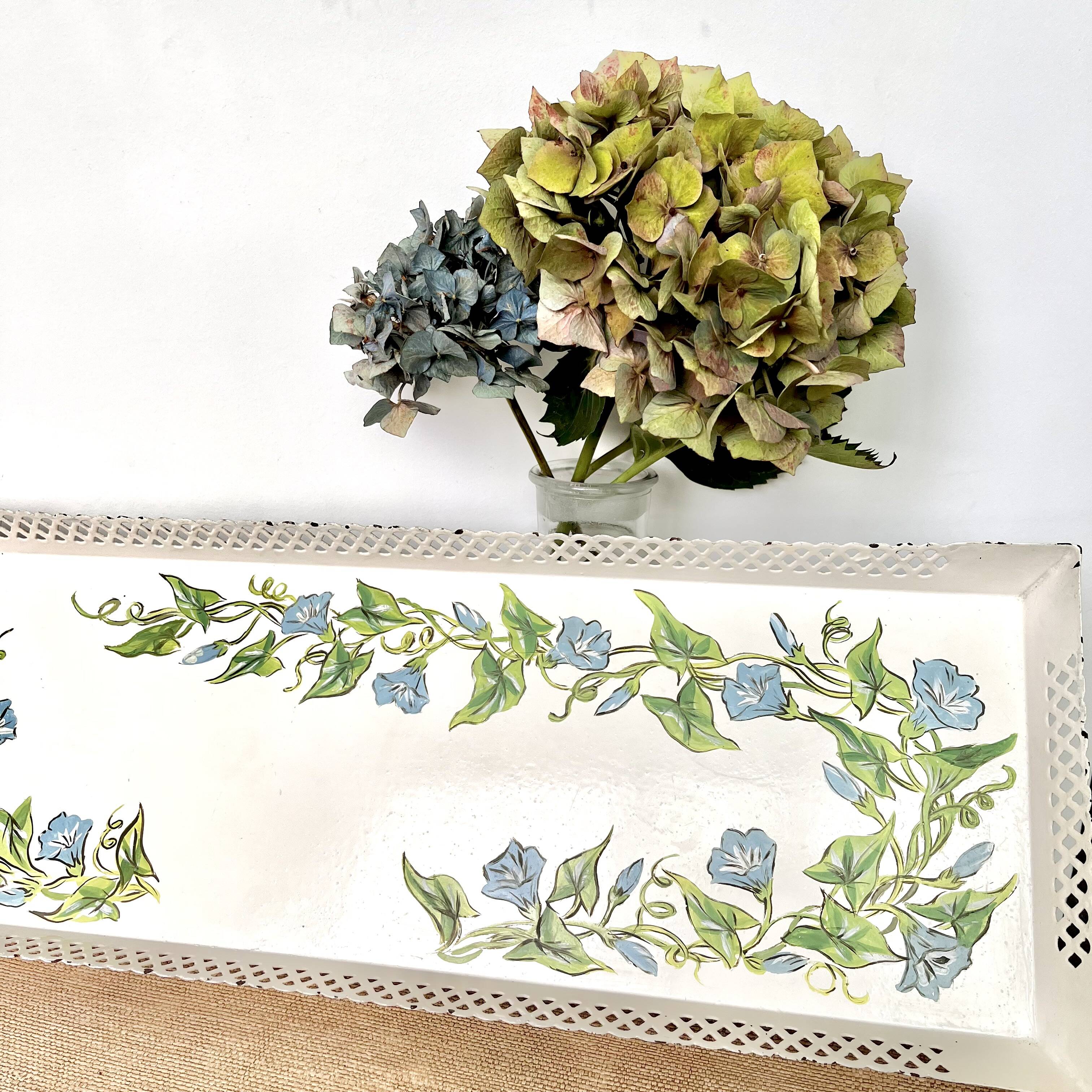 Large painted sheet metal tray with flower decoration