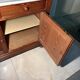 Antique wood and marble kitchen sideboard with carved backsplash