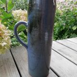 High pitcher in sandstone