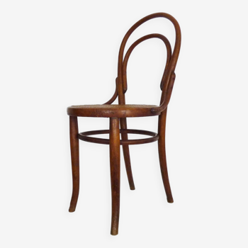 Bistro chair in wood and canework. The 50's