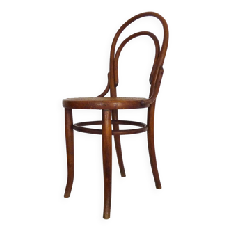 Bistro chair in wood and canework. The 50's