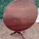 Old and large round winegrower's table made of wood.