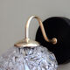 Pair of brass wall sconces and thick glass globe vintage luminaire