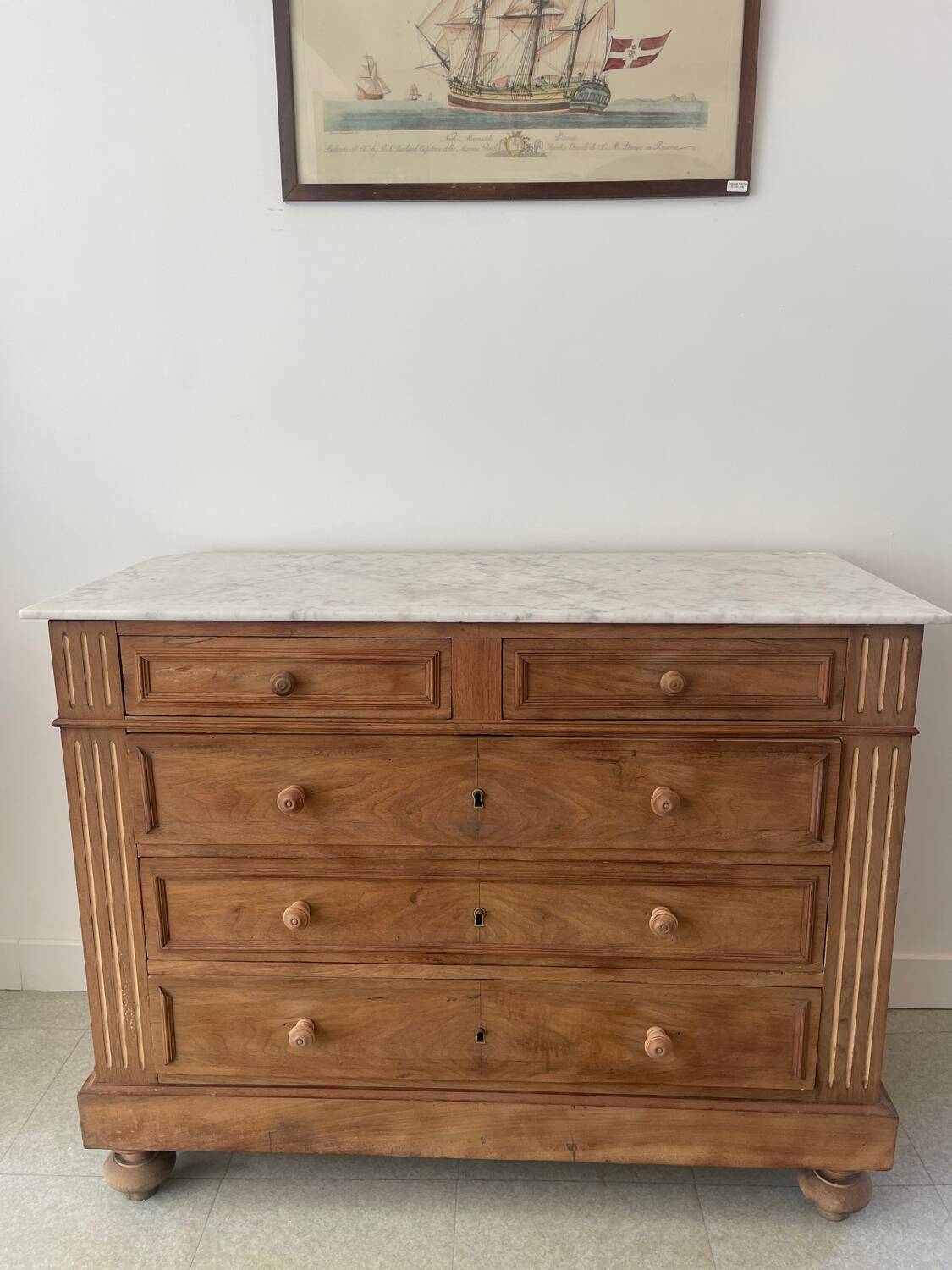 Sandblasted chest of drawers with white marble top