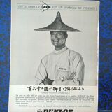 A Dunlop tire paper advertisement from a period magazine