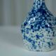 Soliflore en céramique tacheté bleu