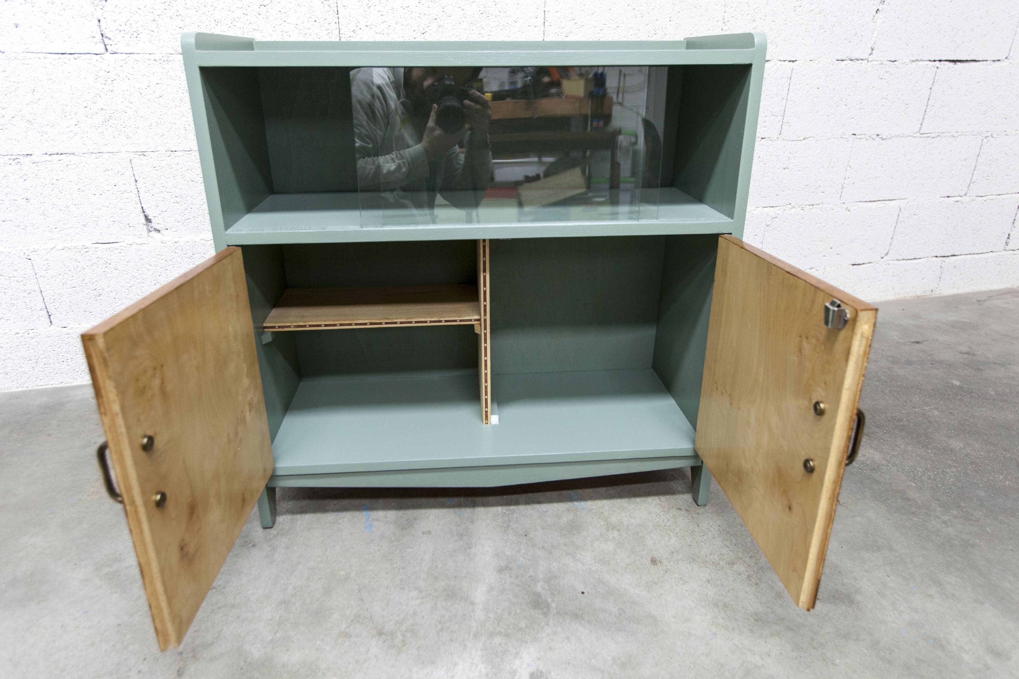 Atypical green noble 1960s low display cabinet.