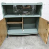 Atypical green noble 1960s low display cabinet.