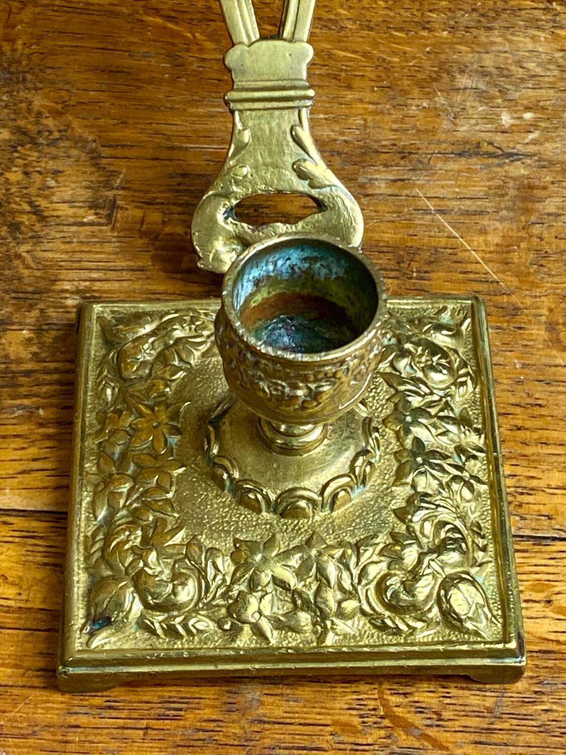 Bronze hand candlestick