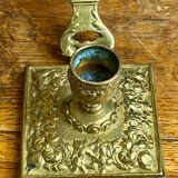 Bronze hand candlestick