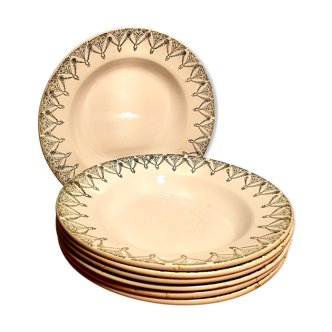Suite of 7 St Amand hollow plates