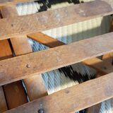 Old foldable stool in tinted wood