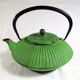 Flat cast iron teapot