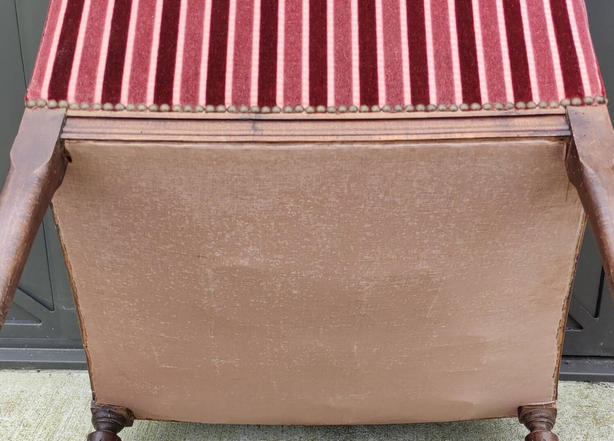 Old armchair and its Louis XVI style footrest/velvet covering