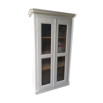 Patinated white bookcase