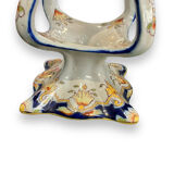 Pair of bougeoirs in rouen earthenware